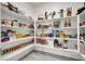 Well-organized walk-in pantry with ample shelving for food storage and kitchen essentials at 6106 Castle Gardens Ave, Las Vegas, NV 89130