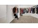 Spacious walk-in closet with custom organization for ample storage at 6106 Castle Gardens Ave, Las Vegas, NV 89130
