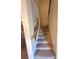Carpeted stairway with wooden railing at 6425 Sierra Sands St, North Las Vegas, NV 89086