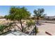 Balcony view overlooking mature trees, and desert landscape at 7135 Polaris Ave, Las Vegas, NV 89118