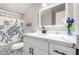 Bathroom featuring a turtle-themed shower curtain and white vanity with black hardware at 7135 Polaris Ave, Las Vegas, NV 89118
