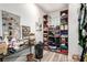 Walk-in closet featuring custom shelving and a dressing area at 7135 Polaris Ave, Las Vegas, NV 89118