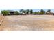 Expansive gravel lot offering abundant space for various outdoor activities at 7135 Polaris Ave, Las Vegas, NV 89118
