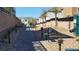 Dog park featuring a walkway, park benches, and a dog waste station at 7375 Davenbury St, Las Vegas, NV 89113