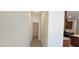 Hallway showing access to the kitchen, bathroom, and closet space at 7375 Davenbury St, Las Vegas, NV 89113
