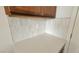 Close-up of modern countertops and backsplash in the kitchen at 7375 Davenbury St, Las Vegas, NV 89113