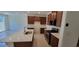 Spacious kitchen with a large island, stainless steel appliances, and modern finishes at 7375 Davenbury St, Las Vegas, NV 89113