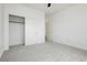 Light filled bedroom with carpet flooring, closet and white walls at 7777 Vino Vranec Ct, Las Vegas, NV 89113