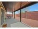 Covered back patio with outdoor seating, ideal for entertaining and relaxation at 8176 Duncan Peak Ct, Las Vegas, NV 89139