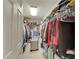 Walk-in closet providing ample storage space for clothing and accessories at 8176 Duncan Peak Ct, Las Vegas, NV 89139