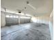 Spacious three-car garage offers ample room for vehicles and storage with convenient access to the home at 8220 Desert Beach Dr, Las Vegas, NV 89128