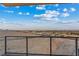 Balcony with panoramic views of the city and surrounding landscape under a bright, partly cloudy sky at 8255 Las Vegas Blvd # 1905, Las Vegas, NV 89123