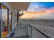 Balcony offering scenic sunset views of the city skyline with clear glass railings at 8255 Las Vegas Blvd # 1905, Las Vegas, NV 89123
