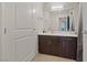Bathroom featuring a sleek vanity with modern fixtures and a large mirror at 8255 Las Vegas Blvd # 1905, Las Vegas, NV 89123