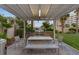 Exterior grill area featuring stainless grill, prep area, bench seating, and an awning at 8255 Las Vegas Blvd # 1905, Las Vegas, NV 89123