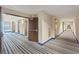 Long hallway with blue striped carpet, elevators, and doors at 8255 Las Vegas Blvd # 1905, Las Vegas, NV 89123