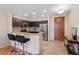 A modern kitchen features stainless steel appliances, granite countertops, and breakfast bar with seating at 8255 Las Vegas Blvd # 1905, Las Vegas, NV 89123