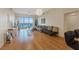 Bright and airy living room with hardwood floors and access to balcony with amazing views at 8255 Las Vegas Blvd # 1905, Las Vegas, NV 89123