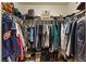 Spacious walk-in closet with clothing racks and shelving for organized storage and personal items at 8255 Las Vegas Blvd # 1905, Las Vegas, NV 89123