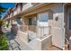 Charming townhouse featuring stucco exterior, private entry, and cozy front patio, creating a welcoming curb appeal at 901 Nevada Sky St, Las Vegas, NV 89128