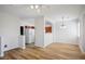 Bright and spacious living room featuring wood floors, modern lighting, and open layout, perfect for entertaining at 901 Nevada Sky St, Las Vegas, NV 89128