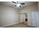 Bedroom with carpet, built-in desk and a mirrored closet at 904 Swift Bear St, Henderson, NV 89002