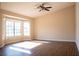 Spacious bedroom featuring vinyl floors, neutral paint, and lots of natural light at 904 Swift Bear St, Henderson, NV 89002