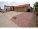 Single story home featuring desert landscaping, a terracotta roof, with a spacious two car garage at 904 Swift Bear St, Henderson, NV 89002