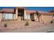 Charming single story home with desert landscaping and terracotta tile roof and a sheltered doorway at 904 Swift Bear St, Henderson, NV 89002