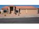 Charming single story home featuring desert landscaping, a terracotta roof, and a spacious two car garage at 904 Swift Bear St, Henderson, NV 89002
