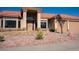 Charming single story home with desert landscaping and terracotta tile roof and a sheltered doorway at 904 Swift Bear St, Henderson, NV 89002