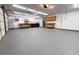 Spacious garage with built-in cabinets, work benches and epoxy flooring at 904 Swift Bear St, Henderson, NV 89002
