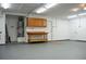 Spacious garage with built-in cabinets, work benches and epoxy flooring at 904 Swift Bear St, Henderson, NV 89002