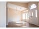 Bright open living room featuring vinyl floors, neutral paint, and lots of natural light at 904 Swift Bear St, Henderson, NV 89002