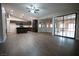 Open floor plan with kitchen, living area, and sliding glass doors for natural light at 904 Swift Bear St, Henderson, NV 89002