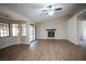 Bright living room featuring large windows, a sliding glass door, and a modern fireplace at 904 Swift Bear St, Henderson, NV 89002