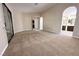 Spacious primary bedroom featuring neutral carpet and access to ensuite bath and outdoor patio at 904 Swift Bear St, Henderson, NV 89002