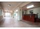 Expansive patio area with a jacuzzi, tiled floors, and bright lighting for outdoor entertainment and relaxation at 904 Swift Bear St, Henderson, NV 89002