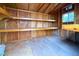 Interior view of a shed with plywood walls and built-in shelving at 904 Swift Bear St, Henderson, NV 89002