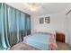 Cozy bedroom with soft lighting, patterned textiles, and a ceiling fan at 9105 Chenin Ave, Las Vegas, NV 89129