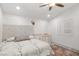 Bright bedroom with a decorative headboard, natural light, and space for a crib at 9105 Chenin Ave, Las Vegas, NV 89129