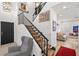 Open entryway with a staircase, modern decor, and lots of natural light at 9105 Chenin Ave, Las Vegas, NV 89129