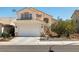Attractive two-story home with tiled roof, two car garage, and tasteful landscaping at 9105 Chenin Ave, Las Vegas, NV 89129