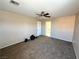 A spacious bedroom with neutral walls, carpet flooring, and a ceiling fan with great natural light at 9148 Patrick Henry Ave, Las Vegas, NV 89149