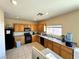 Kitchen with well-lit countertops and essential appliances at 9148 Patrick Henry Ave, Las Vegas, NV 89149