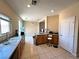 Kitchen equipped with essential appliances and ample counter space at 9148 Patrick Henry Ave, Las Vegas, NV 89149
