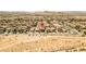 Aerial view of a residential neighborhood in a desert landscape at 9163 W Torino Ave, Las Vegas, NV 89148
