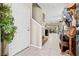 Inviting entryway features tile flooring, neutral paint, and decor in this light-filled open floor plan home at 9163 W Torino Ave, Las Vegas, NV 89148