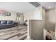 Cozy living room featuring wood-look flooring, neutral paint, and comfortable seating at 9163 W Torino Ave, Las Vegas, NV 89148