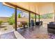 Covered patio offering ample space for outdoor dining, barbecues, and relaxing in the shade at 9163 W Torino Ave, Las Vegas, NV 89148